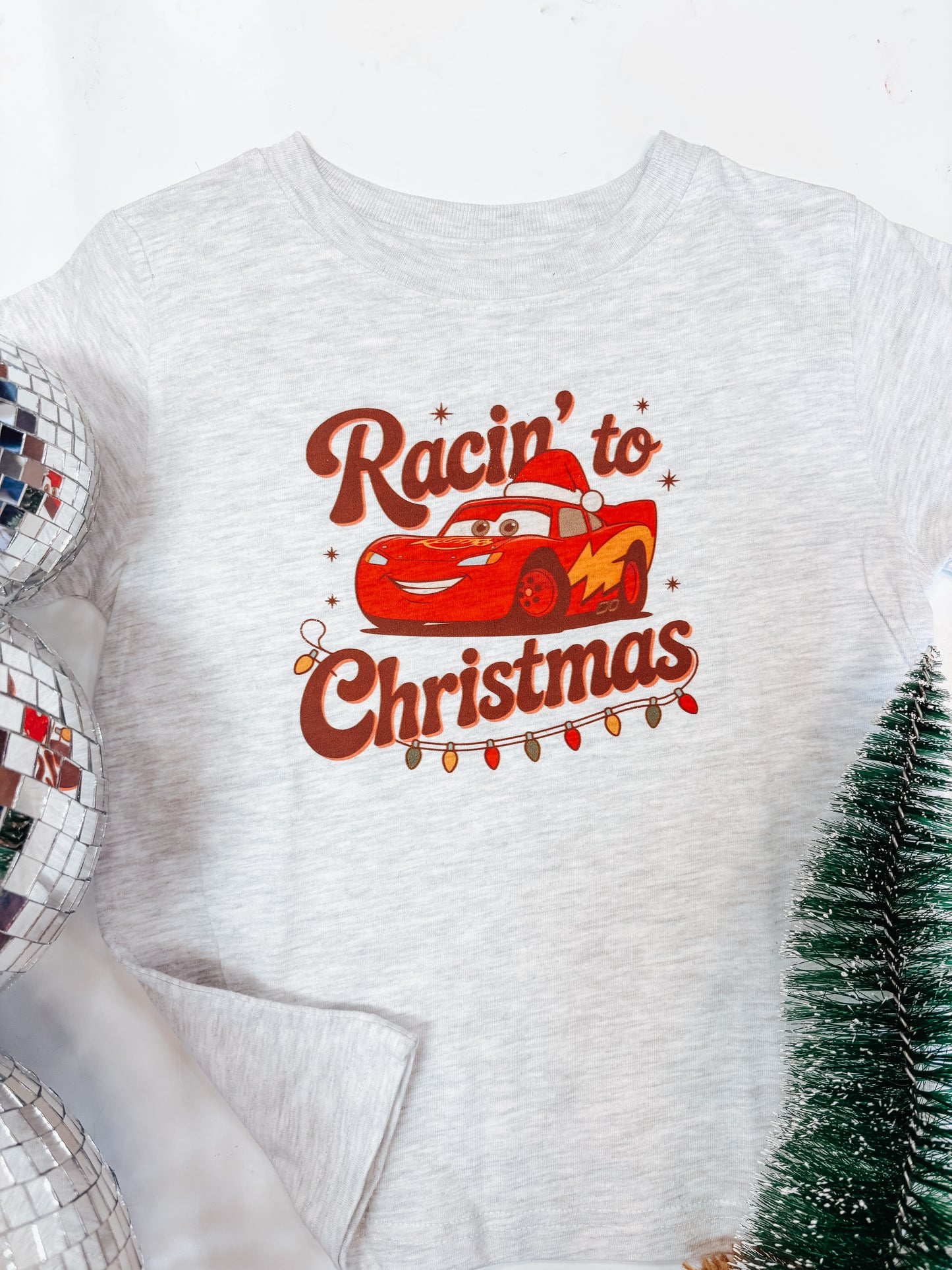 racin to Christmas tee ⚡︎